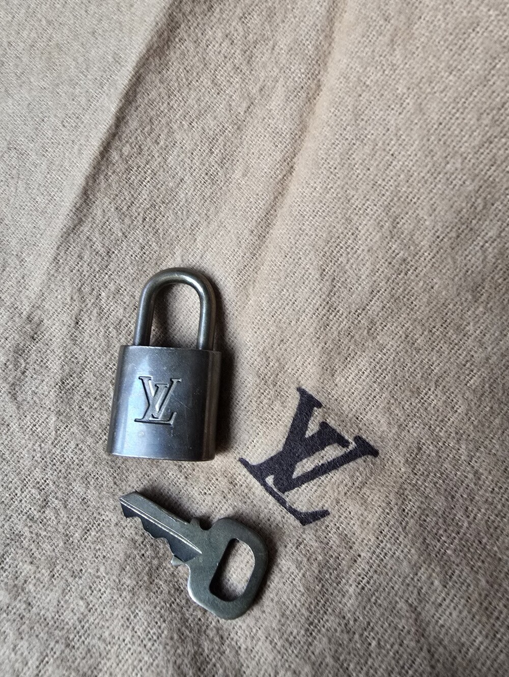Authentic Louis Vuitton Metal Padlock and Key in Gold-Tone